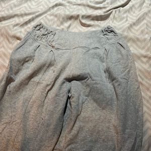 Grey sweats- ties at bottom